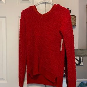 red fuzzy sweater